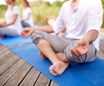 Regular yoga practice may help prevent middle-age spread
