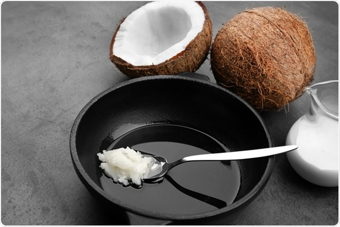Coconut oil on frying pan. Image Credit: Africa Studio / Shutterstock