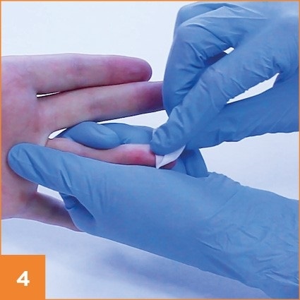 Step 4 in taking a blood prick