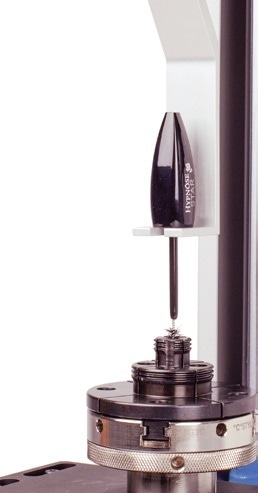 Testing retention force of the mascara brush to its wand