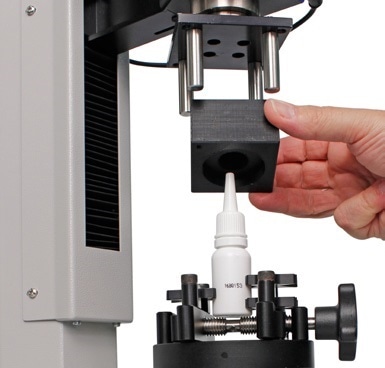Testing release torque of dropper bottle using a dedicated mandrel on Helixa automated tester
