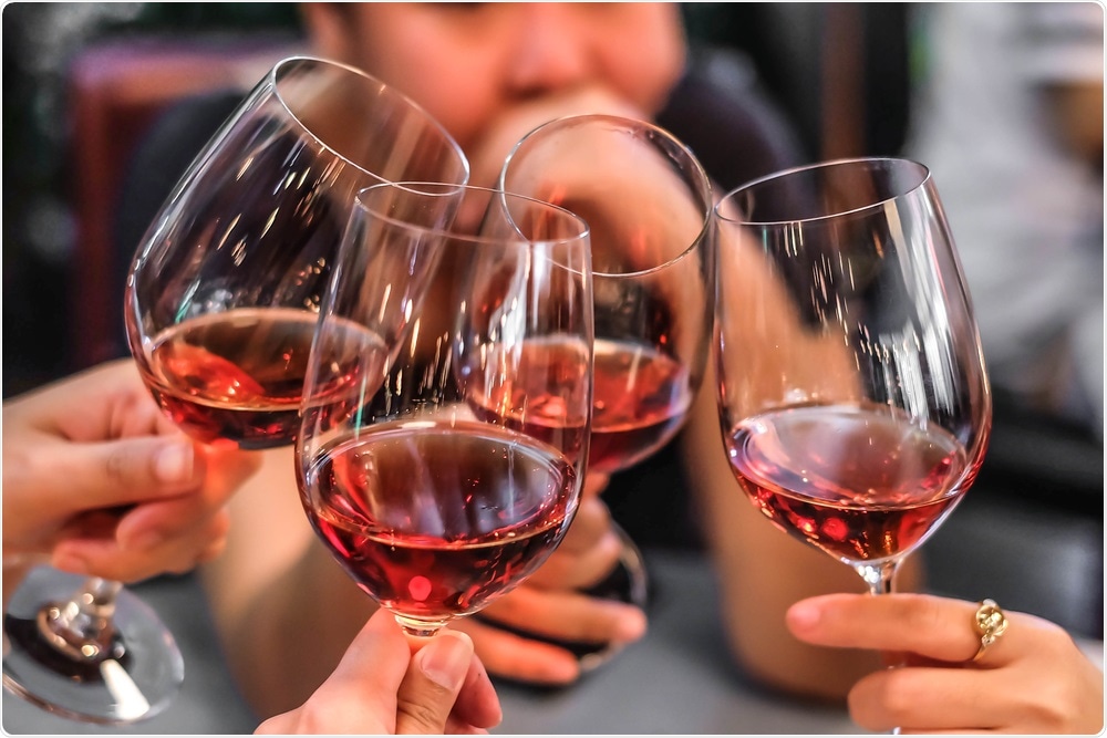 Women drinking wine.