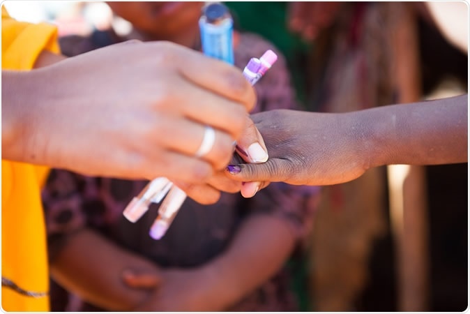 'A child gets a mark after polio vaccination