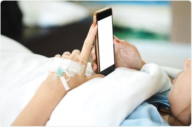 Patient on phone in hospital