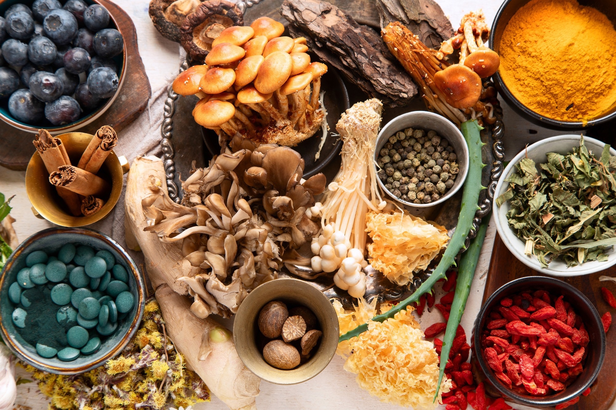 Herbs, spices, mushrooms on light background. Nervine food collection.