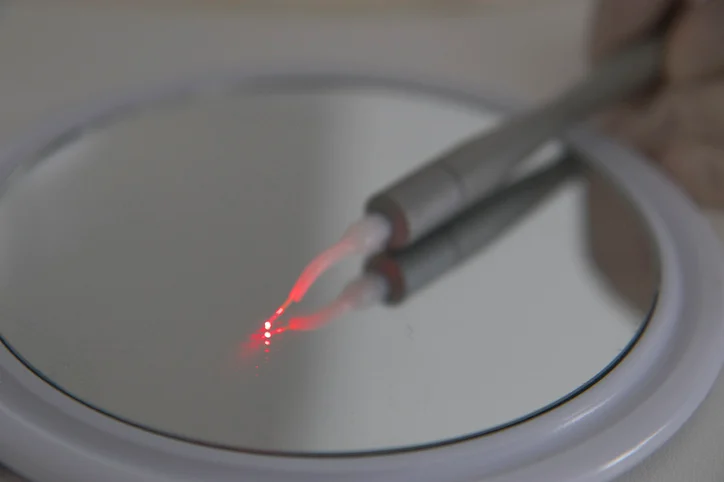 Body temperature sensors for laser-assisted surgery