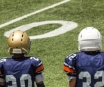 The impact of tackle football on adolescent brain structure and function