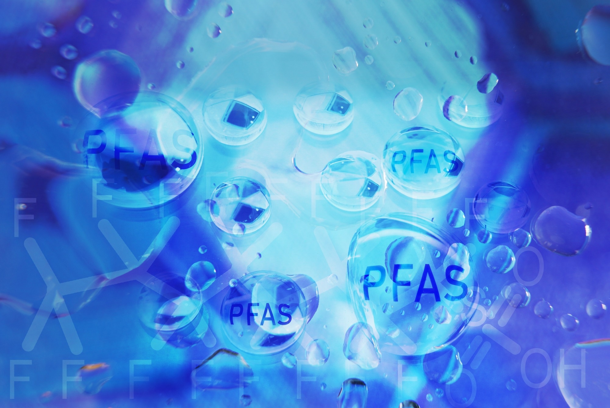 Water droplets with PFAS text.