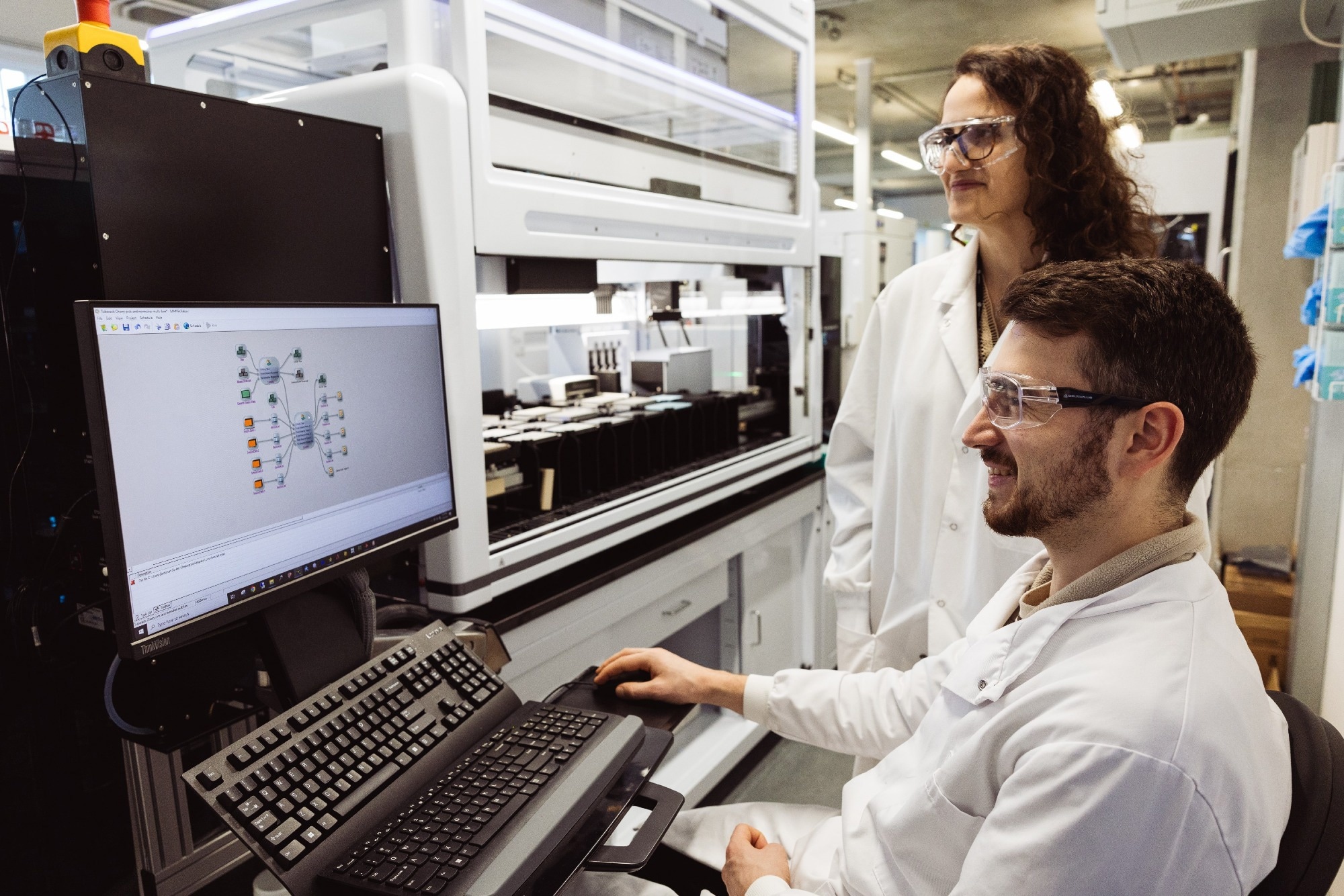 Two people in a labratory.