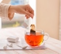 Black tea helps in one Parkinson’s type, but soda and pesticides worsen another
