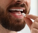 What are the benefits of chewing gum beyond oral health?