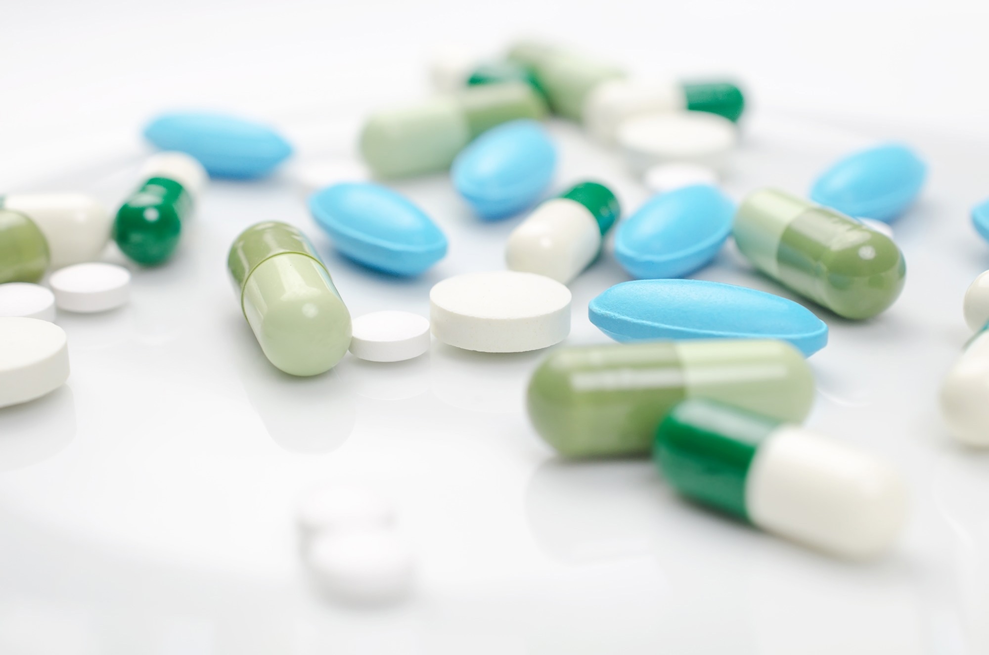 Blue and green pills